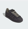 Tenis adidas Superstar 𝐋𝐔𝐀𝐋 en color gris oscuro con textura de piel de cocodrilo y punta de concha clásica.